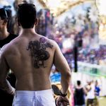 Shirts off at this festival seems to be a rule, photo by Rodrigo Zaim and Lucas Jacinto #tomorrowlandbrazil #festival #tattoostyle #RodrigoZaim #LucasJacinto #dragon