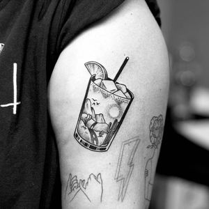 Long drives and good drinks tattoo by Paperboy Tattoo #PaperboyTattoo #drinktattoos #blackandgrey #traditional #newtraditional #landscape #alcohol #lime #glass #cocktail #cacti #cactus #desert