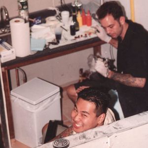 Steven Huie getting tattooed by Chris Garver back in the day (IG—stevenhuie_flyrite). #ChrisGarver #hardcore #SteveHuie #punkrock