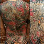 Intense back piece dragon tattoo done by Horisuzu. #Horisuzu #Taku #UnbreakableTattoo #JapaneseTattoo #dragon #ryu #sakura #japanese