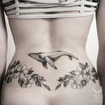 Garden-inspired tattoo by Zihwa. #Zihwa #blackwork #subtle #garden #flower #plant #whale