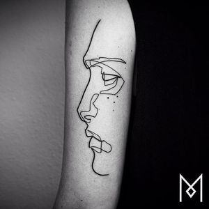 Single line face profile tattoo by Mo Ganji. #MoGanji #minimalist #singleline #continuousline #portrait #face #profile