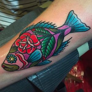 Cool fish tattoo by Jenn Siegfried #fish #rose #traditional #JennSiegfried