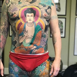 A serene bodysuit featuring the Buddha and flora by Luca Ortis (IG—lucaortis). #Buddha #Irezumi #Japanese #largescale #LucaOrtis #traditional