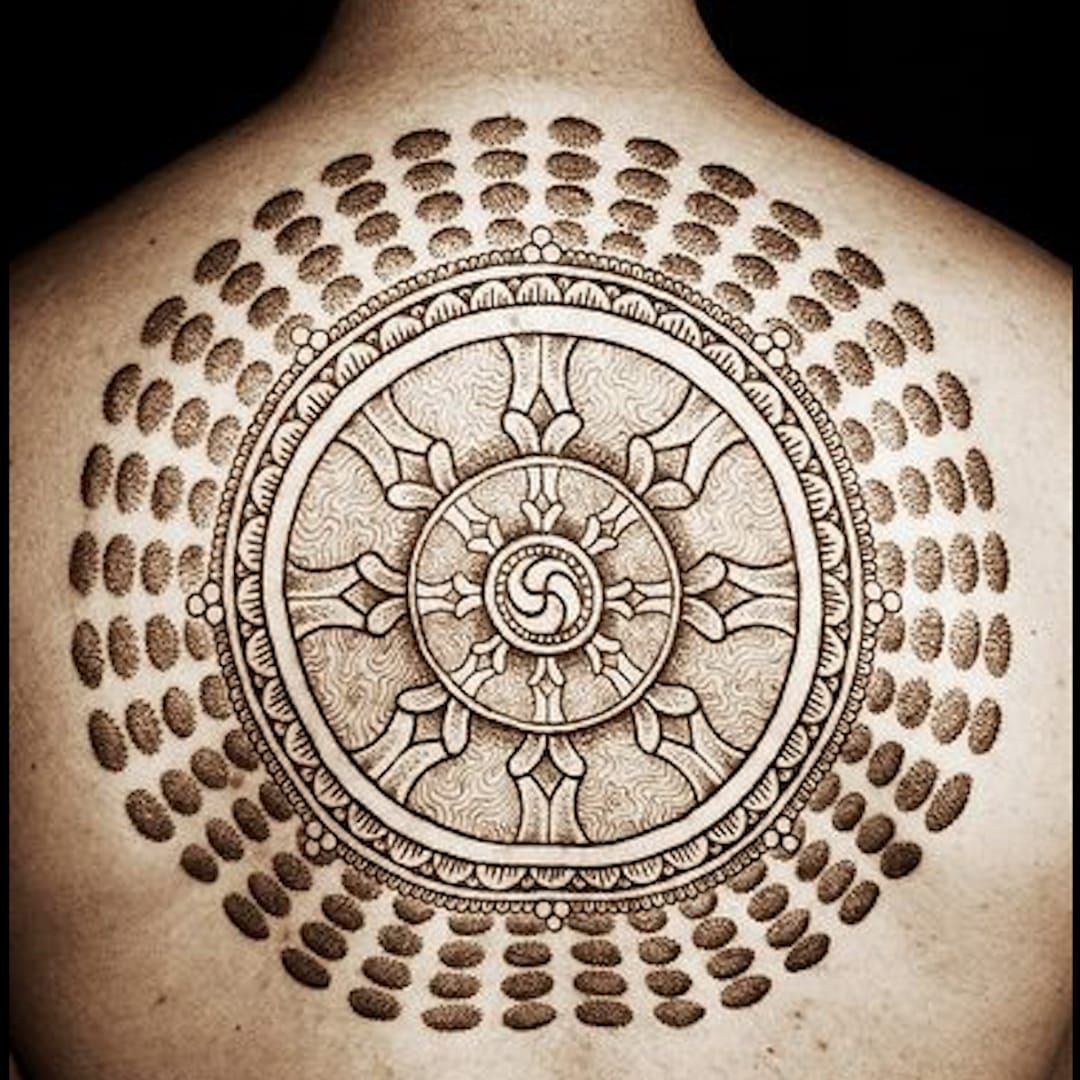 Keep Your Eyes on the Path and Your Hands on Dharma Wheel Tattoos • Tattoodo