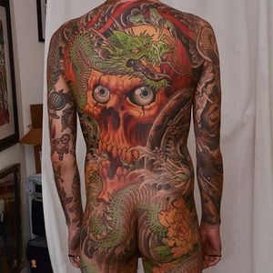 Back-piece by Peter Lagergren #PeterLagergren #color #neotraditional #largescale #dragon #skull #flower #tattoooftheday