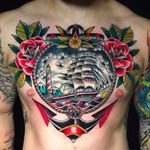 Incredible nautical inspired tattoo by Tom Lortie. #TomLortie #traditionaltattoo #coloredtattoo #anchor #galleon #lighthouse