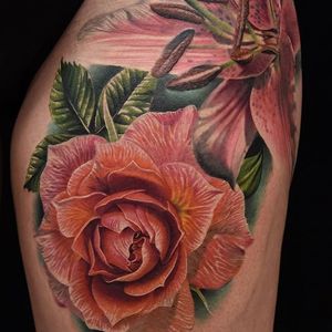 A rose next to a tiger lily by Phil Garcia (IG—philgarcia805). #color #flowers #PhilGarcia #realism #rose #tigerlily
