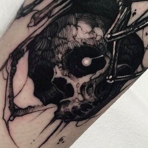 Detail shot of a rad tattoo done by Brandon Herrera. #brandonherrera #darktattoos #skull #blackwork #btattooing