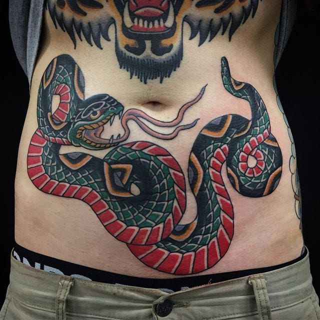 Traditional style cobra on stomach by Kevin Rodriguez in Sheboygan  Wisconsin  rtattoos