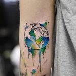 All the color (and life) is bleeding out of the world. Tattoo by Georgia Grey. #illustrative #sketchy #watercolor #GeorgiaGrey #world #earth #inksplatter