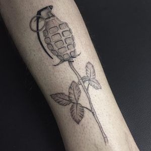 Grenade rose tattoo by Jessica Aaron #JessicaAaron #fineline #blackandgrey #monochrome #finelineblackandgrey #grenade #rose