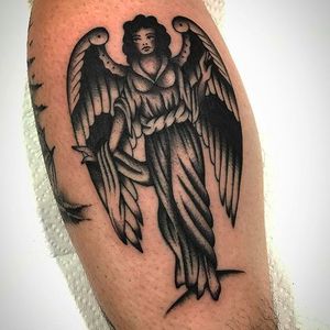 Super clean black work angel tattoo by Bradley Kinney. #bradleykinney #DanaPointTattoo #traditional #bold #angel