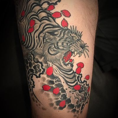 Angery tiger tattoo by Matt Beckerich #MattBeckerich #blackandgrey #Japanese #traditionaljapanese #irezumi #tiger #junglecat #cat #wildlife #fangs #cherryblossoms #petals #flower #redink #tattoooftheday