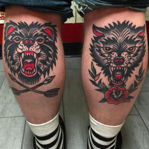 Clean and solid bear and wolf heads by Aldo Rodriguez. #AldoRodriguez #GrandUnionTattoo #traditionaltattoo #boldtattoos #bear #wolf #topclasstattooing #realtattoos #brightandbold