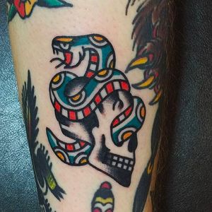 Rad skull and snake combo. Solid tattoo by Joshua Marks. #JoshuaMarks #ETS #traditionaltattoos #boldtattoos #classic #snake #skull