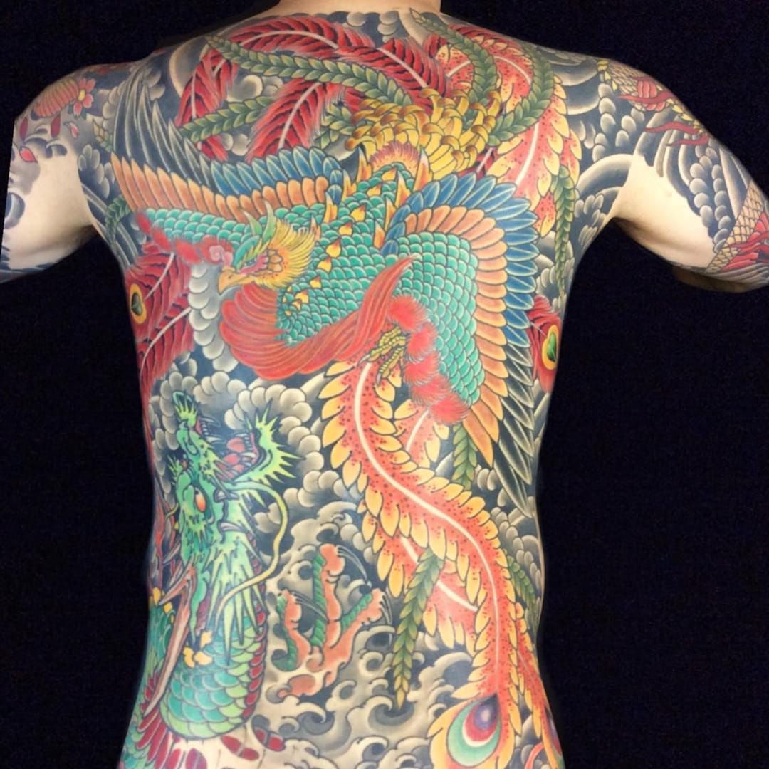 Tattoo Uploaded By Ross Howerton A Back Piece Showing The Union Between The Japanese Dragon And Phoenix By Henning Jorgensen Ig Henning Royaltattoo Henningjorgensen Houou Irezumi Japanese Phoenix Traditional Tattoodo