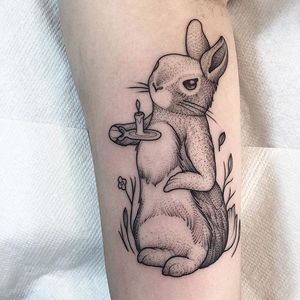 The cutest rabbit ever holding a candle by Lawrence Edwards (IG—feraleyes). #animals #blacktattoo #lawrenceedwards #pointillism #rabbit