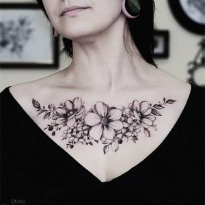 Delicate flower tattoo on the chest #DianaSeverinenko #floral #flower #blackwork