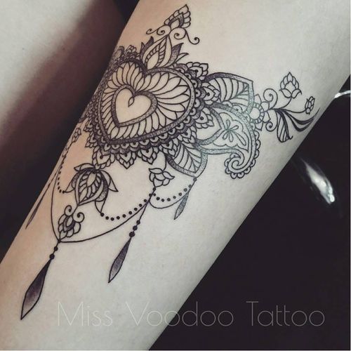 Heart-shaped tattoo by Miss Voodoo #MissVoodoo #ornamental #lace #mehndi #chandelier #feather #heart
