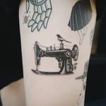 Sewing machine tattoo by Tattooist Banul #Banul #fashiontattoos #blackwork #fineline #detailedblackwork #small #sewingmachine #realistic #bird #sewing #craft #fashion #style #tattoooftheday