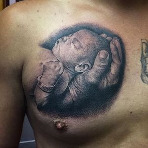 Baby portrait tattoo by Stephen McConnell. #realism #blackandgrey #StephenMcConnell #baby #child #hand