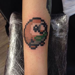 A pixelated portrait of Rowlet by Yearsinaday (IG—stolen_days_tattoo). #GameBoy #Nintendo #Pokémon #Rowlet #Yearsinaday
