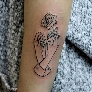 Linework hands and rose tattoo by Sven Eigengrau. #blackwork #SvenEigengrau #linework #rose #flower #hands