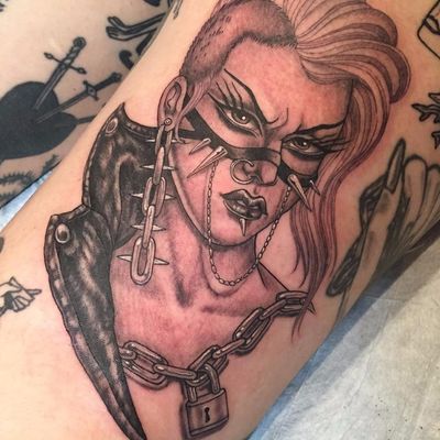 Mad Max-esque babe by Tamara Santibanez #TamaraSantibanez #blackandgrey #oldschool #illustrative #portrait #lady #studs #chains #spikes #leather #jewelry #punk #tattoooftheday