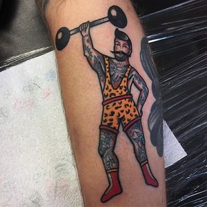 A tattooed strongman from Adam Cornish's body of work (IG-adamcornishtattooer_otc). #AdamCornish #bold #bright #strongman #traditional