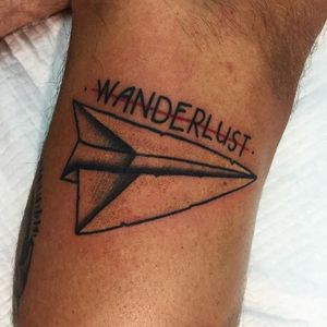 Paper airplane tattoo by James Ghrey. #traditional #newtraditional #JamesGhrey #paperplane #plane #wanderlust