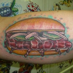 Take a bite of this tasty McRib tattoo by Matt Johnson (via IG -- matt_johnson_tattooer) #mattjohnson #mcdonalds #mcdonaldstattoo