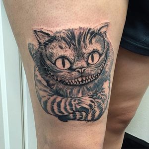 Tattoo by David Mushaney. #cheshirecat #aliceinwonderland