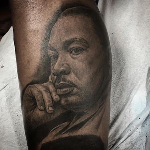 Dr. MLK Jr tattoo by Chuey Quintanar #ChueyQuintanar #portraittattoos #realism #realistic #hyperrealism #blackandgrey #MartinLutherKing #MLK #activist #hero #tattoooftheday