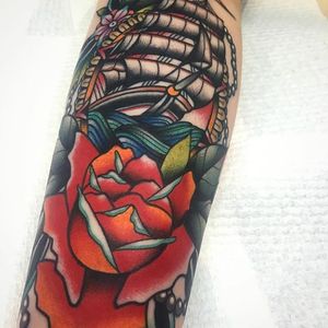 A classic rose forefronts a ship, with some intense detailing. AHOY! By Kirk Jones. (via IG—kirk_jones_tattoo) #nautical #traditional #bright #bold #kirkjones