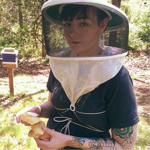 A photo of a beekeeper with tattoos. #beekeeper #beesleeve #bugs