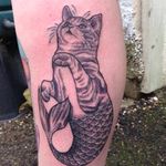 Purrmaid tattoo of Sophie Osborne. #woodcut #asda #blackwork #cat #mermaid #purrmaid #mythical #fantasy