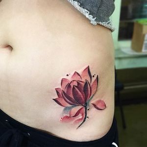 Smooth watercolor lotus tattoo by June Jung. #watercolor #painterly #flower #lotus #JuneJung