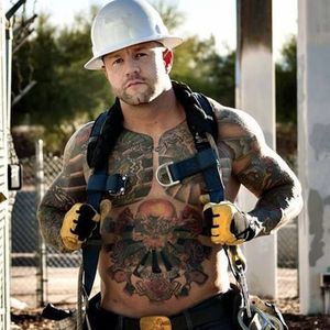 A photograph of a heavily tattooed construction worker. #bluecollar #constructionworker #workingclass