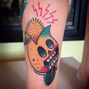 Mango skull tattoo by @sharkytattoos. #traditional #skull #mango #fruit #sharkytattoos