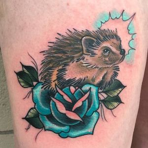 Hedgehog tattoo by Matt Aldridge. #hedgehog #animal #flower #mattaldridge