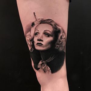 Marlene Dietrich tattoo by Rocky Burley #RockyBurley #ladytattoo #ladyhead #portrait #realism #realistic #hyperrealism #actress #marlenedietrich #smoking #cigarettes #jewel #bow #lady #famous #tattoooftheday