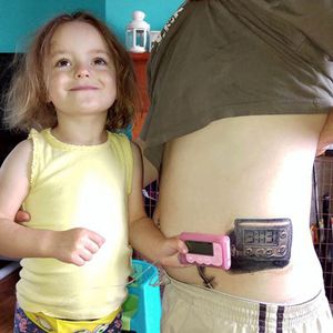 The insulin pump and the tattoo of it side by side. #dad #daughter #diabetes #diabetic #family #heartwarming #inspirational #insulinpump #love