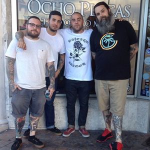 Betancourt (second from left) and the rest of the Ocho Placas Tattoo family. #JavierBetancourt #OchoPlacas #tattooartist #artist
