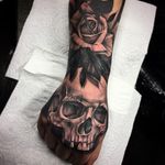 Tattooed skull and rose hand tattoo by Bobby Loveridge @bobbalicious_tattoo #black #blackandgray #churchyardtattoostudio #uk #skull #rose