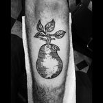 Blackwork pear tattoo by @nachotattoobrooklyn. #blackwork #linework #pear #fruit #nachotattoobrooklyn