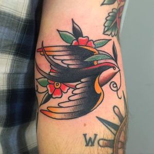 Cute little swallow bird tattoo by Nate Graves. #NateGraves #Sacred #michigan #neotraditional #swallow #bird