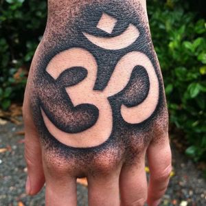 Om Dotwork Tattoo on Hand by Unknown Artist #Om #Ohm #OmTattoo #Hand #Dotwork #blackwork #spiritualtattoo