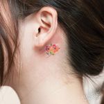 Floral behind-the-ear tattoo by Graffittoo. #Graffittoo #flower #floral #microtattoo #fineline #subtle #micro #tiny #feminine #girly #behindtheear #trend #southkorean
