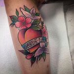 Floral peach tattoo by Gentil Homme Tattoo. #traditional #neotraditional #fruit #flower #peach #GentilHommeTattoo